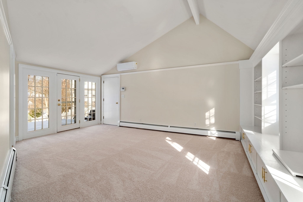101 Adams Road Concord, MA 01742 - Photo 13 of 26 a view of an empty room with a window
