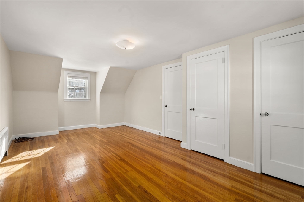 101 Adams Road Concord, MA 01742 - Photo 22 of 26 a view of empty room with wooden floor