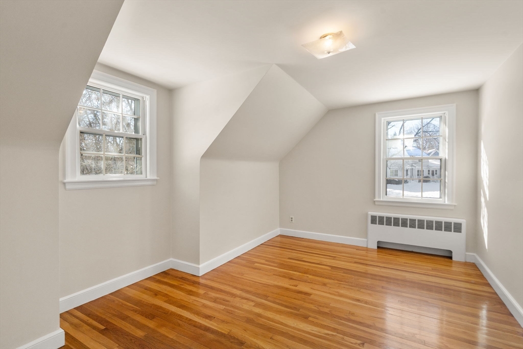 101 Adams Road Concord, MA 01742 - Photo 24 of 26 a view of empty room with wooden floor and fan