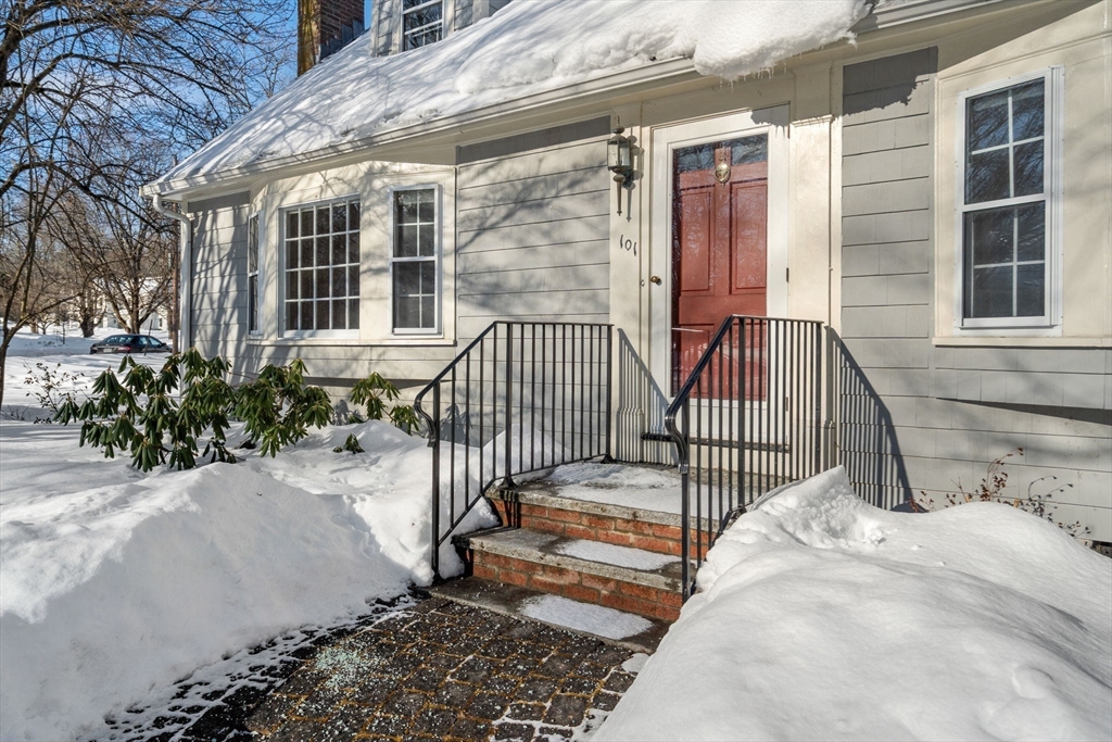 101 Adams Road Concord, MA 01742 - Photo 4 of 26 a view of a house with a wooden fence