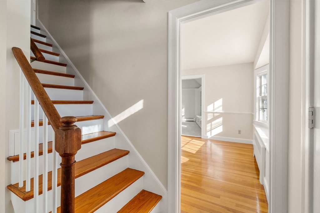 101 Adams Road Concord, MA 01742 - Photo 7 of 26 a view of entryway with wooden floor