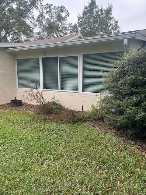 8670 Southwest 97th Street, Unit A Ocala, FL 34481 - Photo 14 of 15 a house view with a outdoor space
