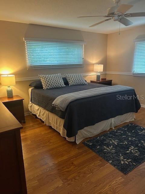8670 Southwest 97th Street, Unit A Ocala, FL 34481 - Photo 6 of 15 a bedroom with a bed and window