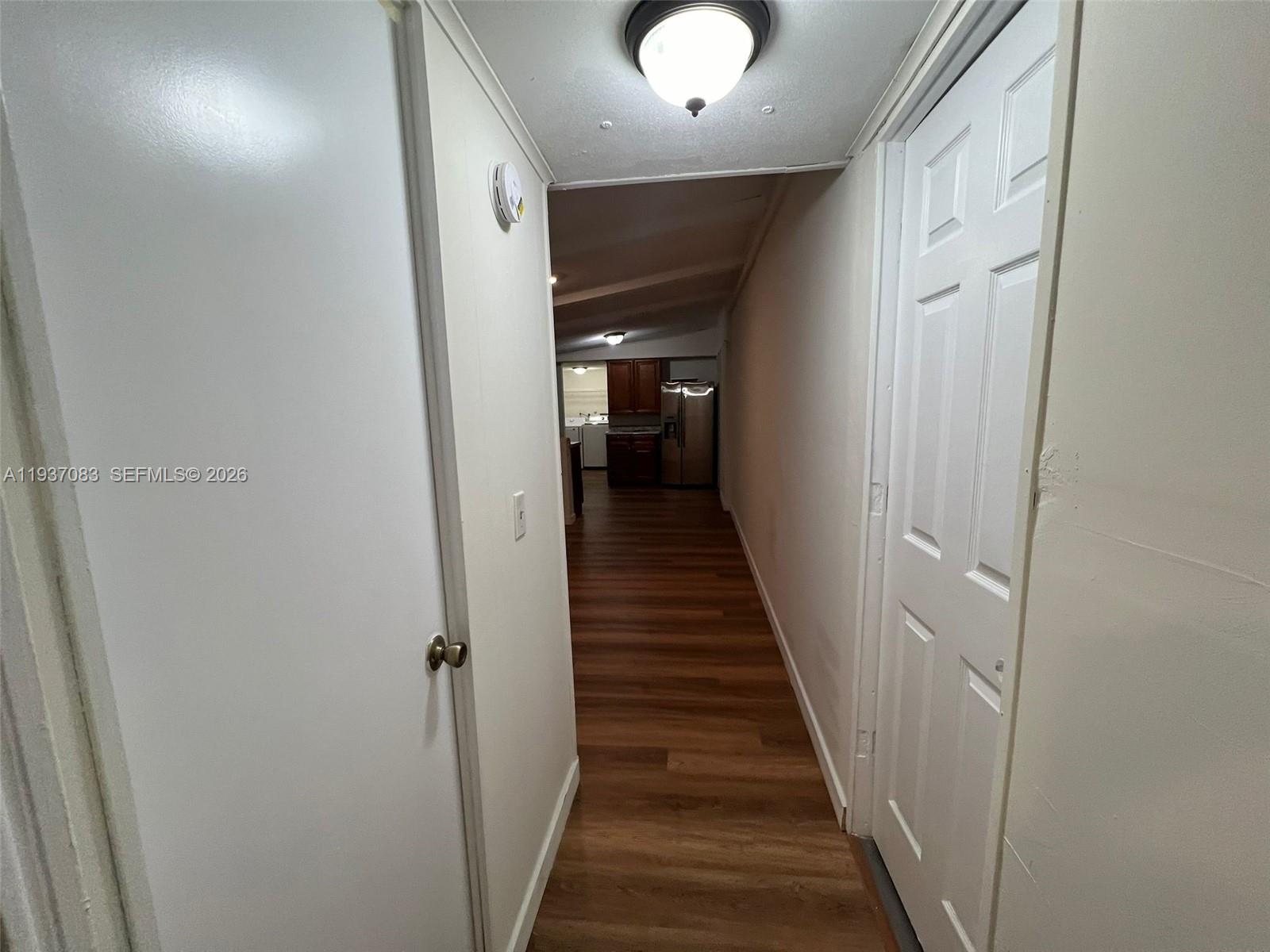 10492 South 228th Lane, Unit A Boca Raton, FL 33428 - Photo 23 of 37 a view of a hallway with a hallway