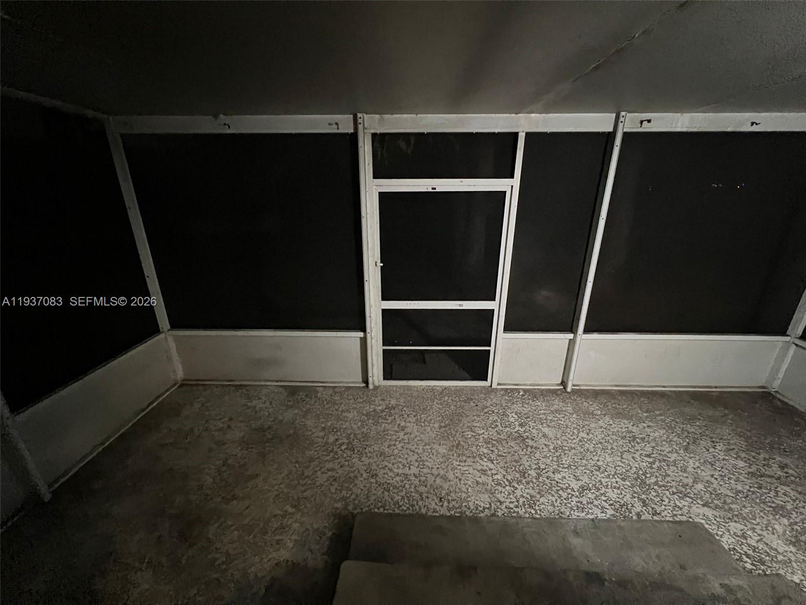 10492 South 228th Lane, Unit A Boca Raton, FL 33428 - Photo 10 of 37 a view of storage and utility room with wooden floor