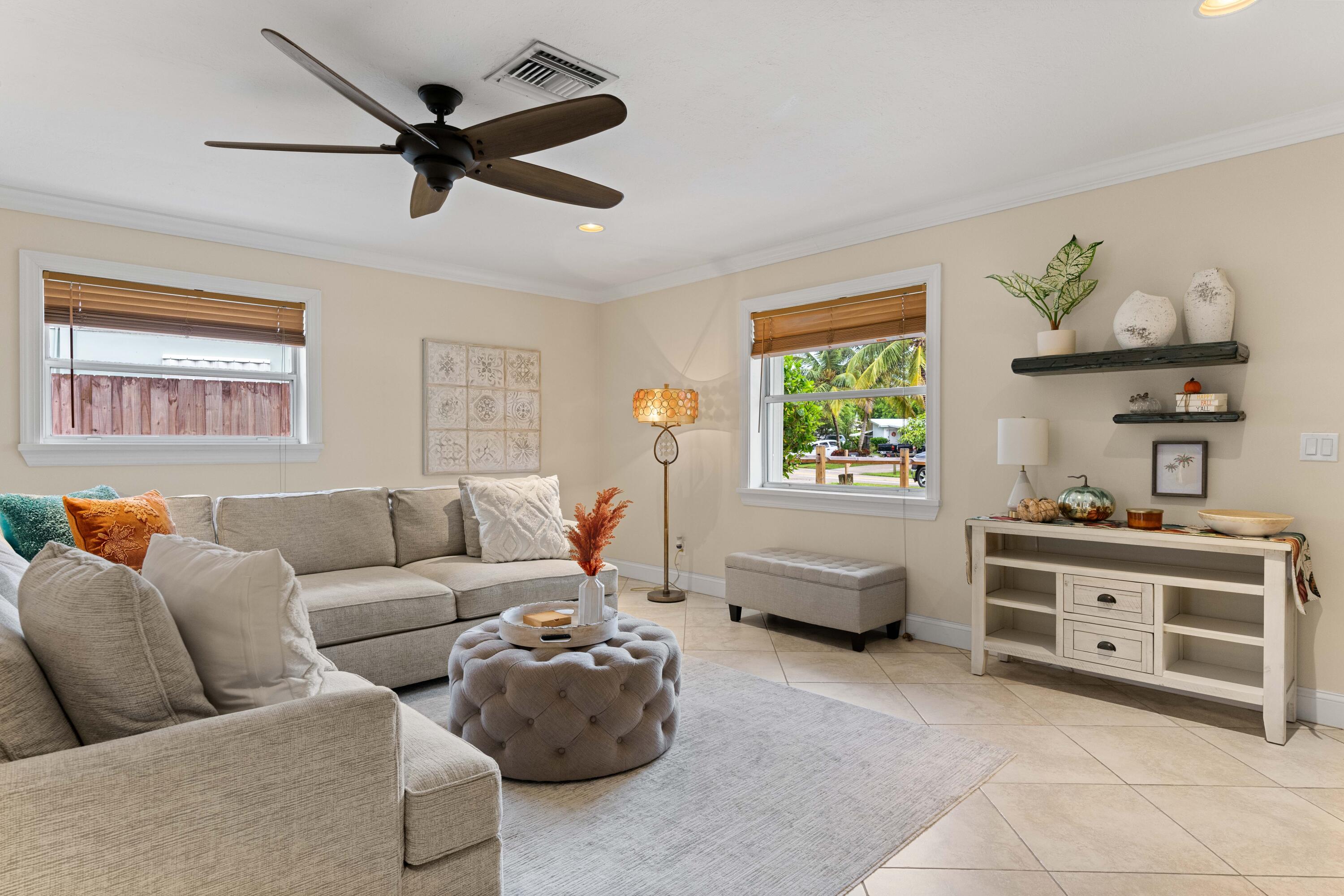 212 West Whitney Drive Jupiter, FL 33458 - Photo 18 of 23 a living room with furniture and a window