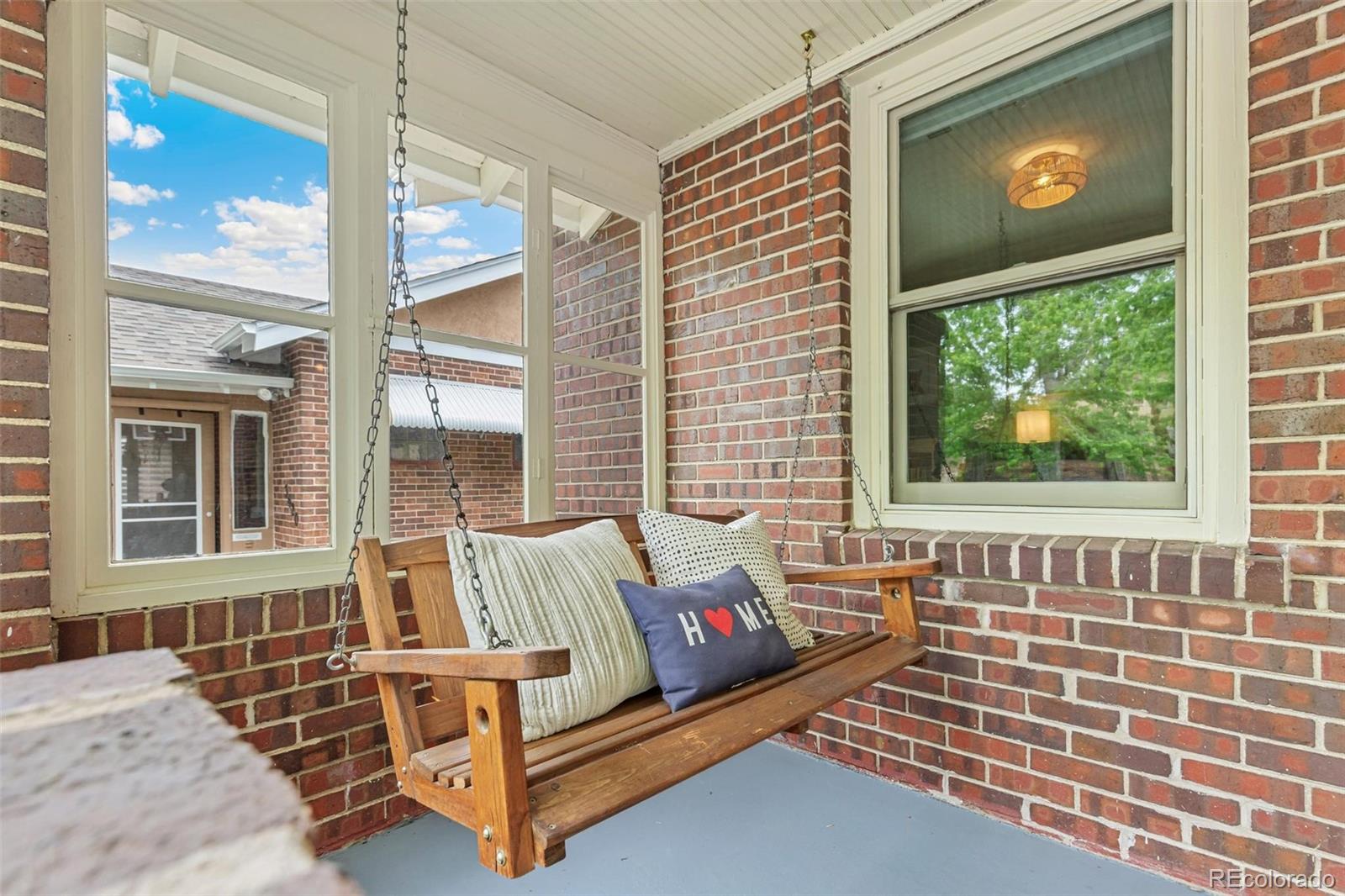 3612 Perry Street Denver, CO 80212 - Photo 37 of 50 a view of a balcony with couch