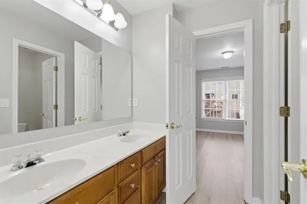 a bathroom with a toilet and a bathtub