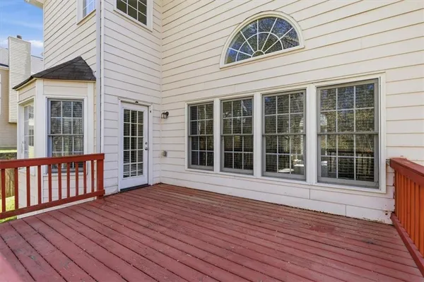 a view of backyard with green space