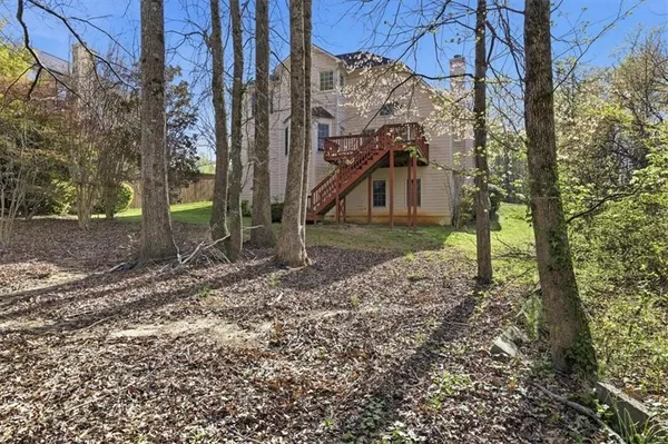 a brick building with a sign on it