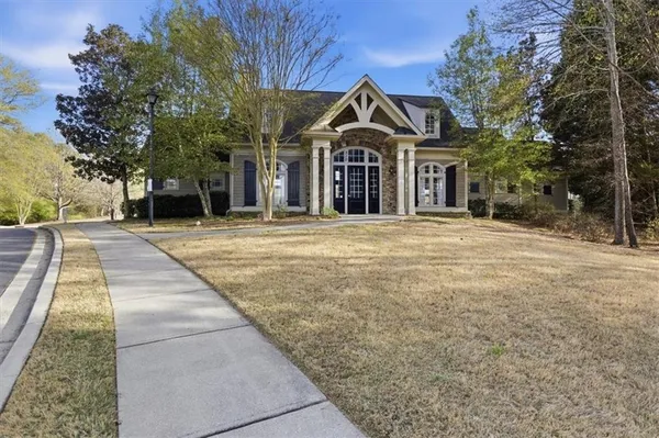 a view of a playground with basketball court