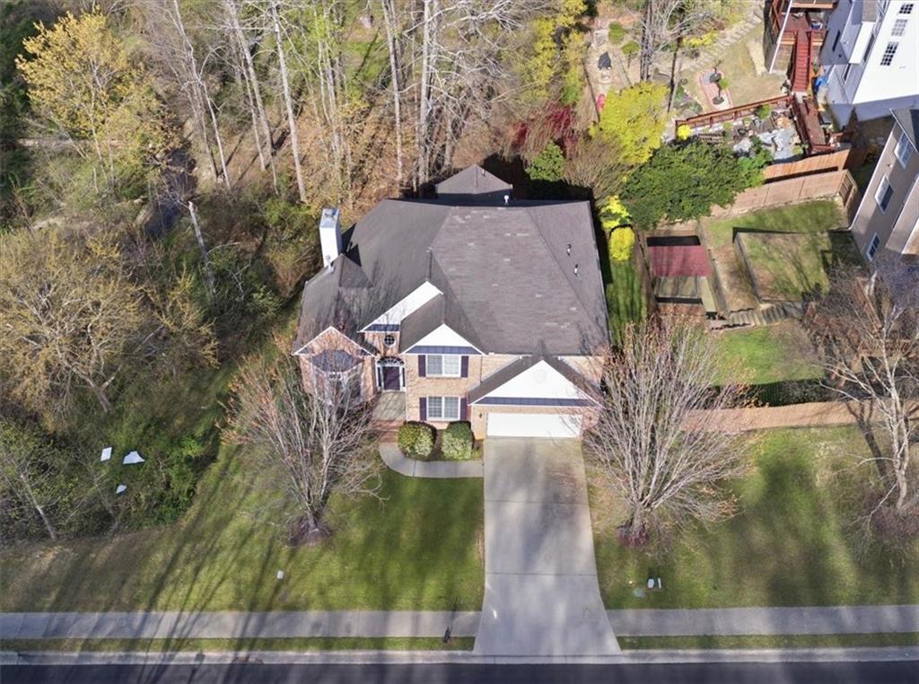 1660 Rosemist Trail Grayson, GA 30017 - Photo 5 of 52 a aerial view of a house with a yard