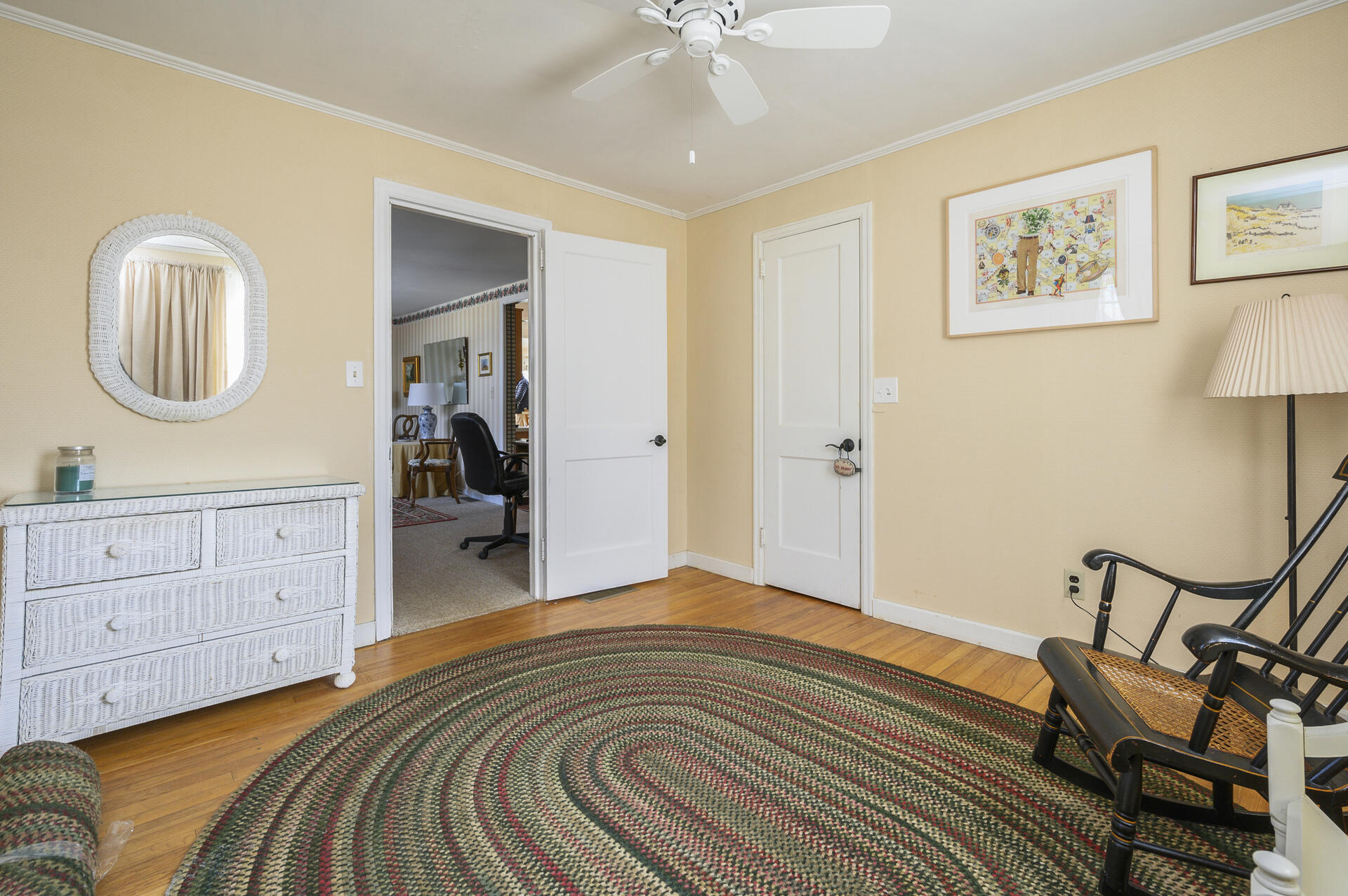 26 Harbor Hills Road Centerville, MA 02632 - Photo 15 of 20 a bedroom with a bed and a chandelier