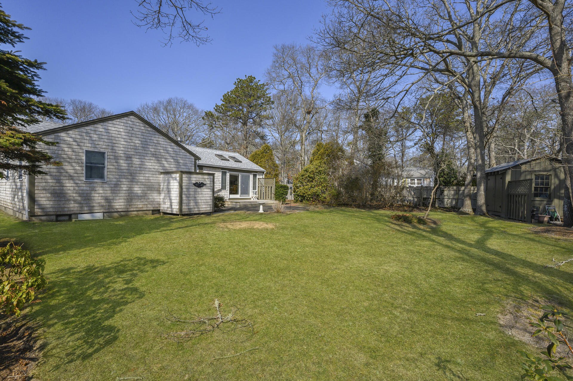 26 Harbor Hills Road Centerville, MA 02632 - Photo 19 of 20 a front view of house with yard and green space