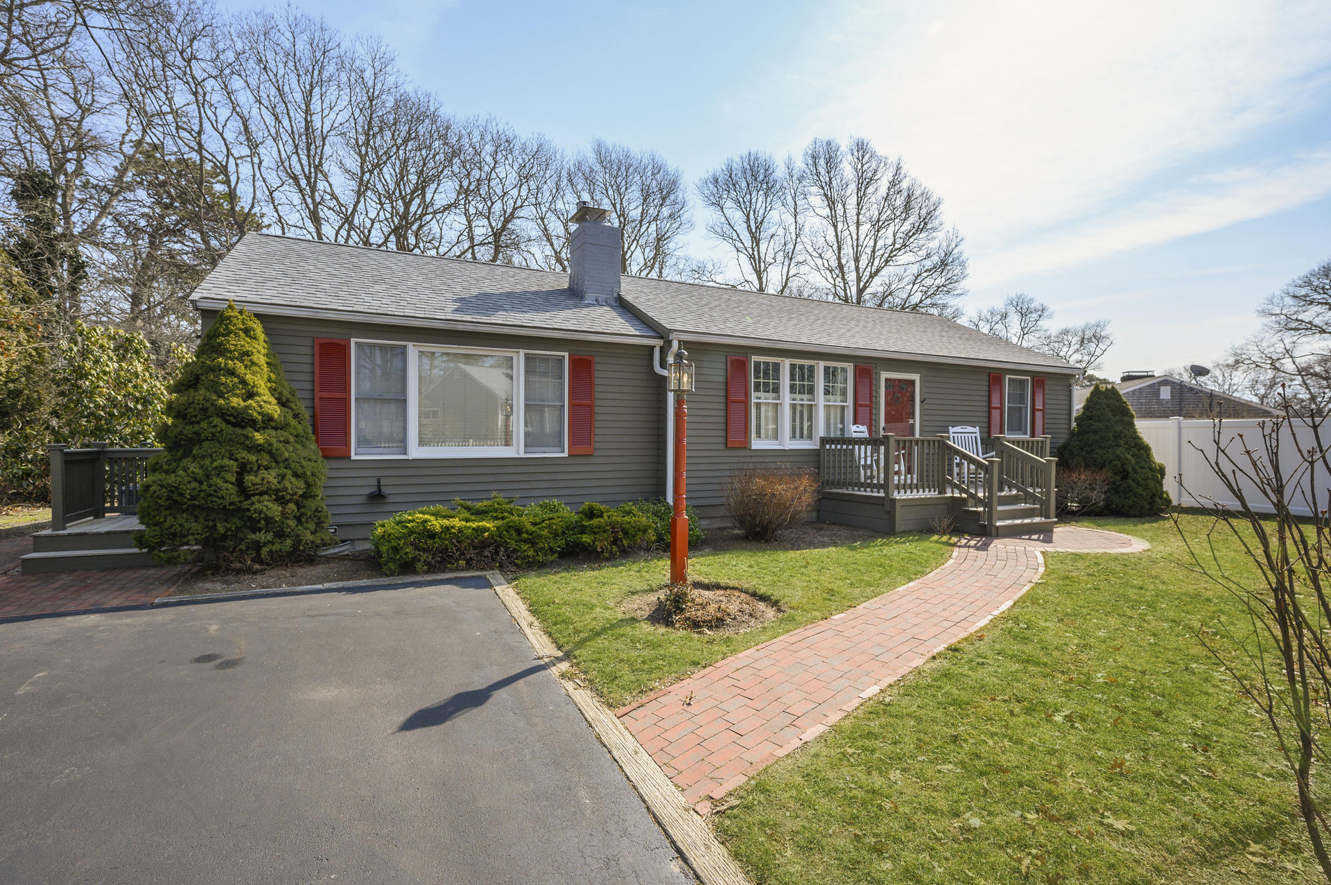 26 Harbor Hills Road Centerville, MA 02632 - Photo 2 of 20 a house view with a garden space