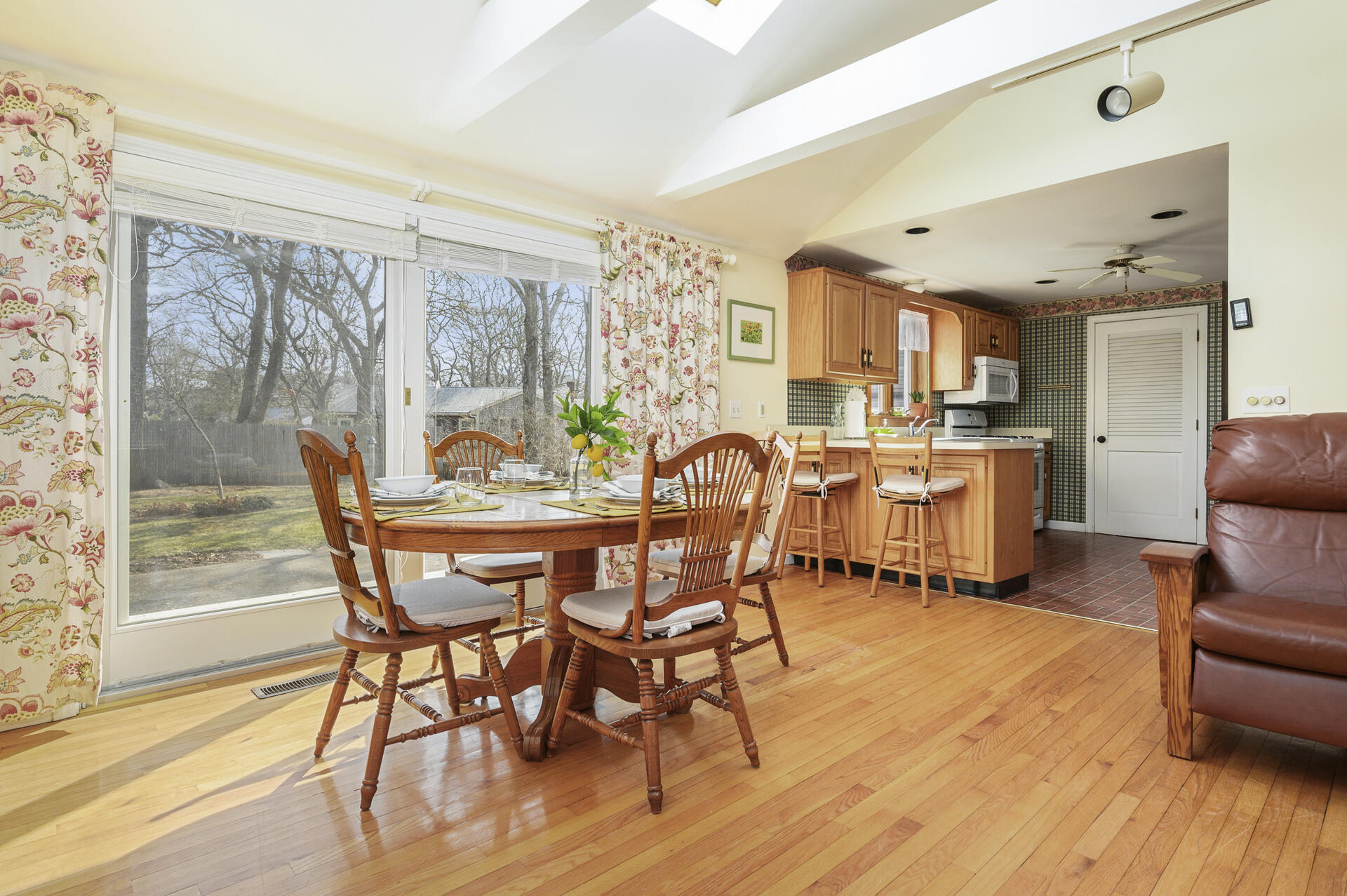 26 Harbor Hills Road Centerville, MA 02632 - Photo 6 of 20 a dining room with furniture and wooden floor