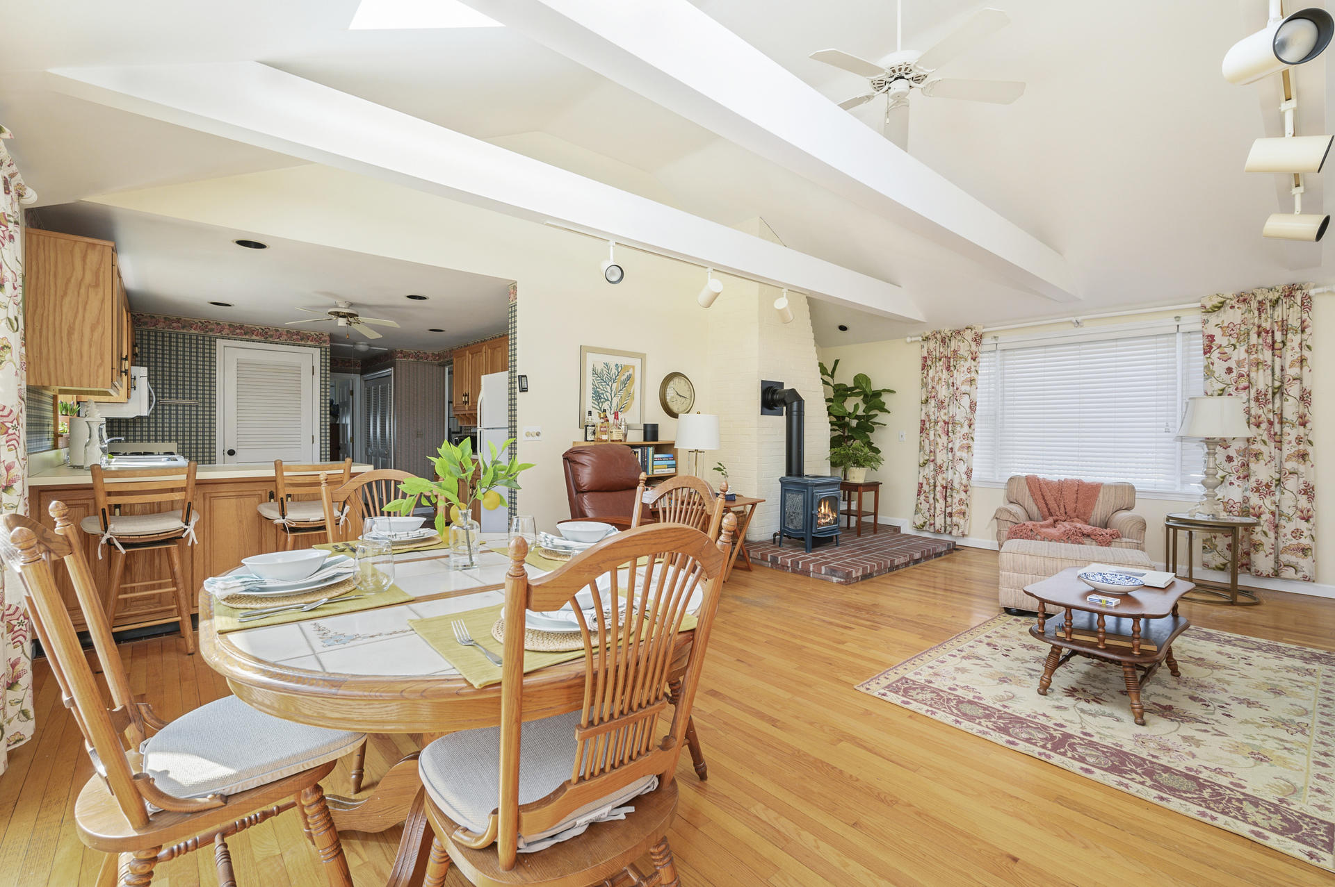 26 Harbor Hills Road Centerville, MA 02632 - Photo 7 of 20 a dining room with furniture a rug and wooden floor