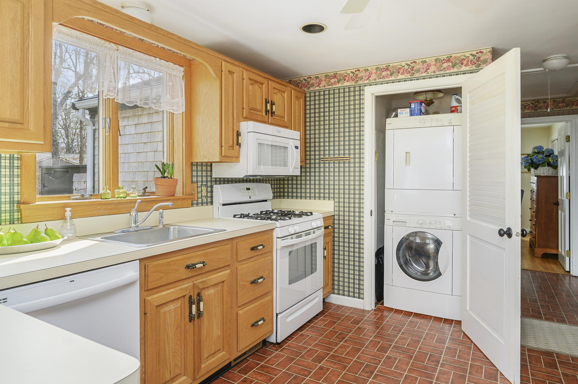 26 Harbor Hills Road Centerville, MA 02632 - Photo 10 of 20 a kitchen with a sink cabinets and a window