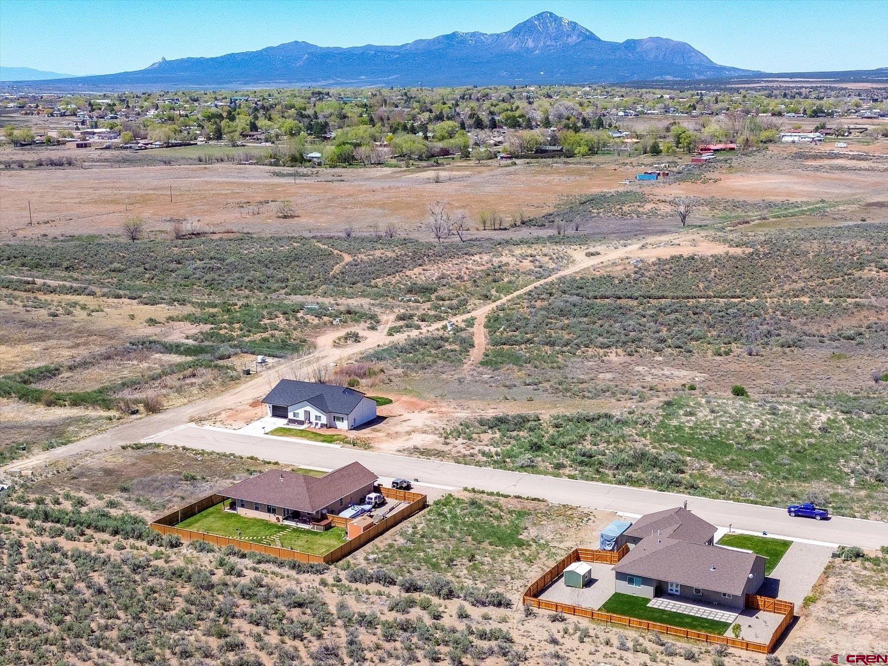 Lot 37 Golf Course Lane Cortez, CO 81321 - Photo 6 of 11 a view of a backyard with a mountain
