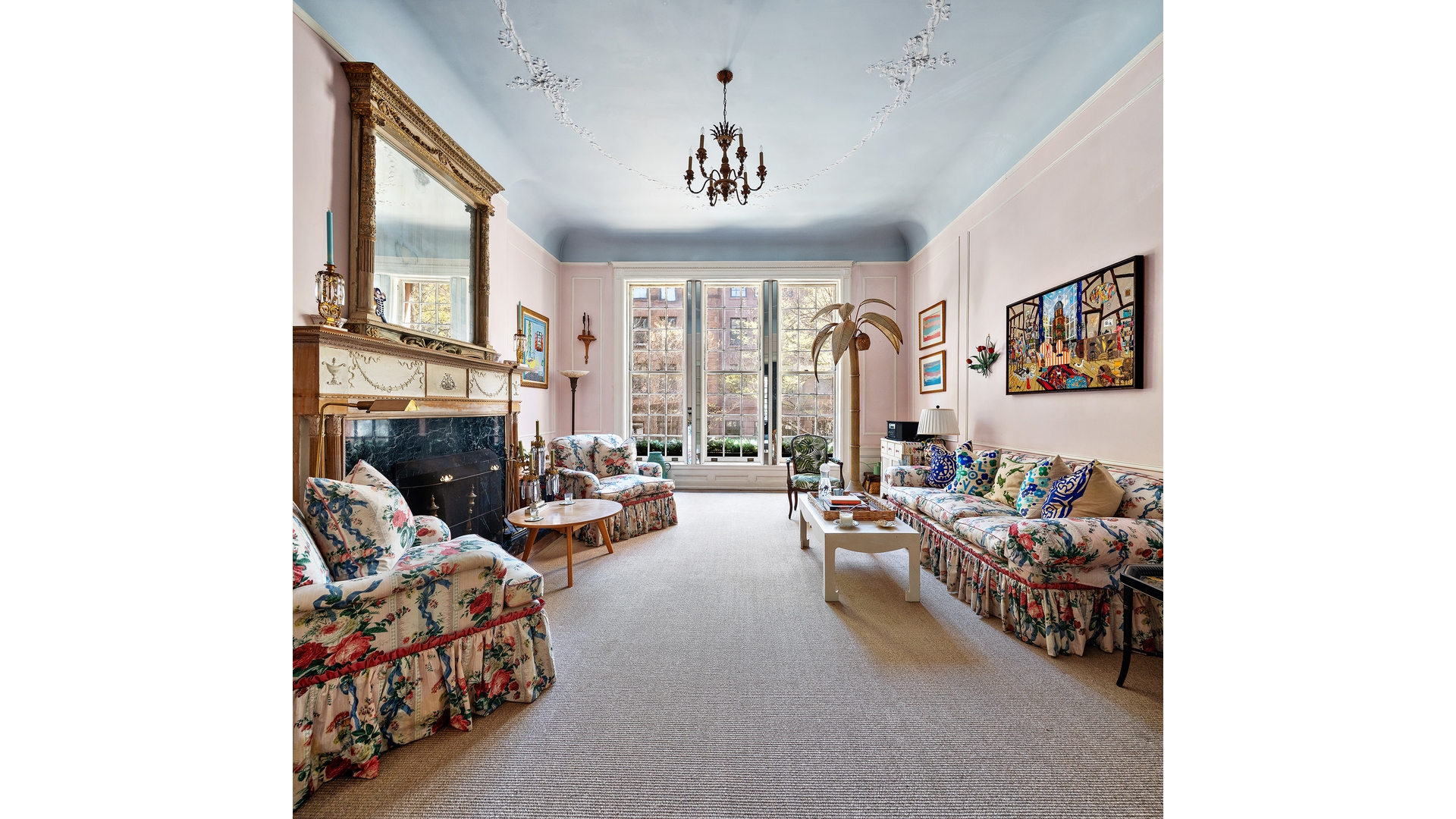 321 West 77th Street Manhattan, NY 10024 - Photo 2 of 12 a living room with furniture and a large window