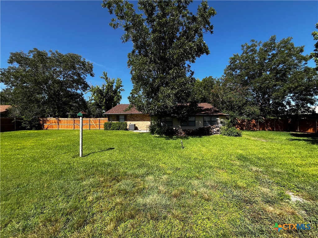151 Mockingbird Lane Lampasas, TX 76550 - Photo 18 of 22 a view of a house with a backyard