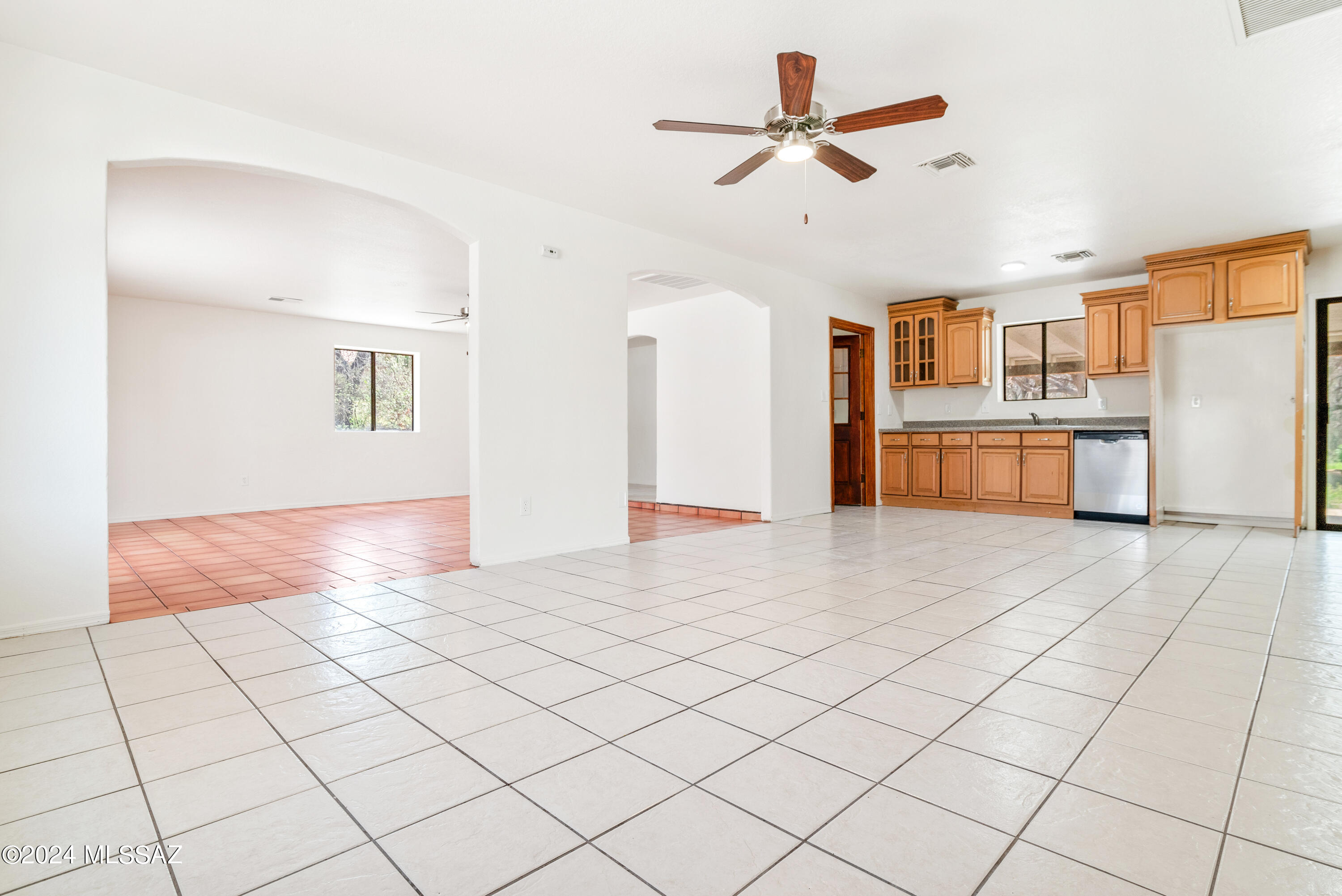 273 Harpo Court Rio Rico, AZ 85648 - Photo 10 of 34 a view of kitchen and dining area with cabinets