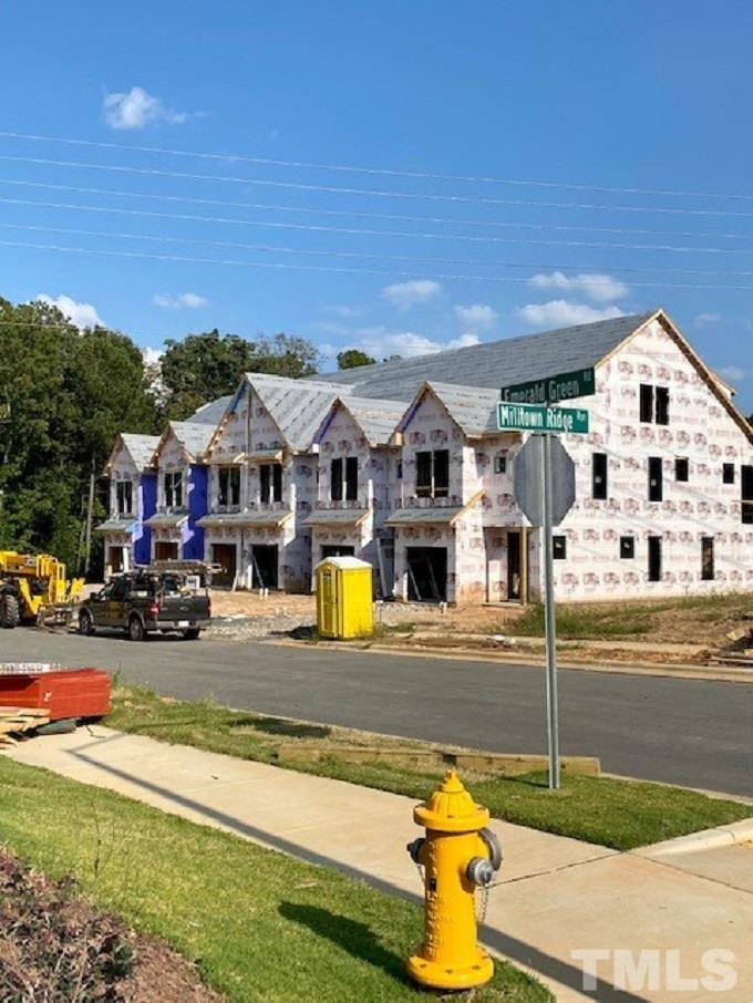 4008 Emerald Green Road Raleigh, NC 27612 - Photo 2 of 24 Building has just finished framing 9-18-22. Great deadend street with lots of trees around.