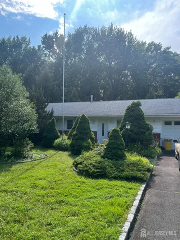 a view of a house with a garden