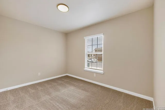 an empty room with a window