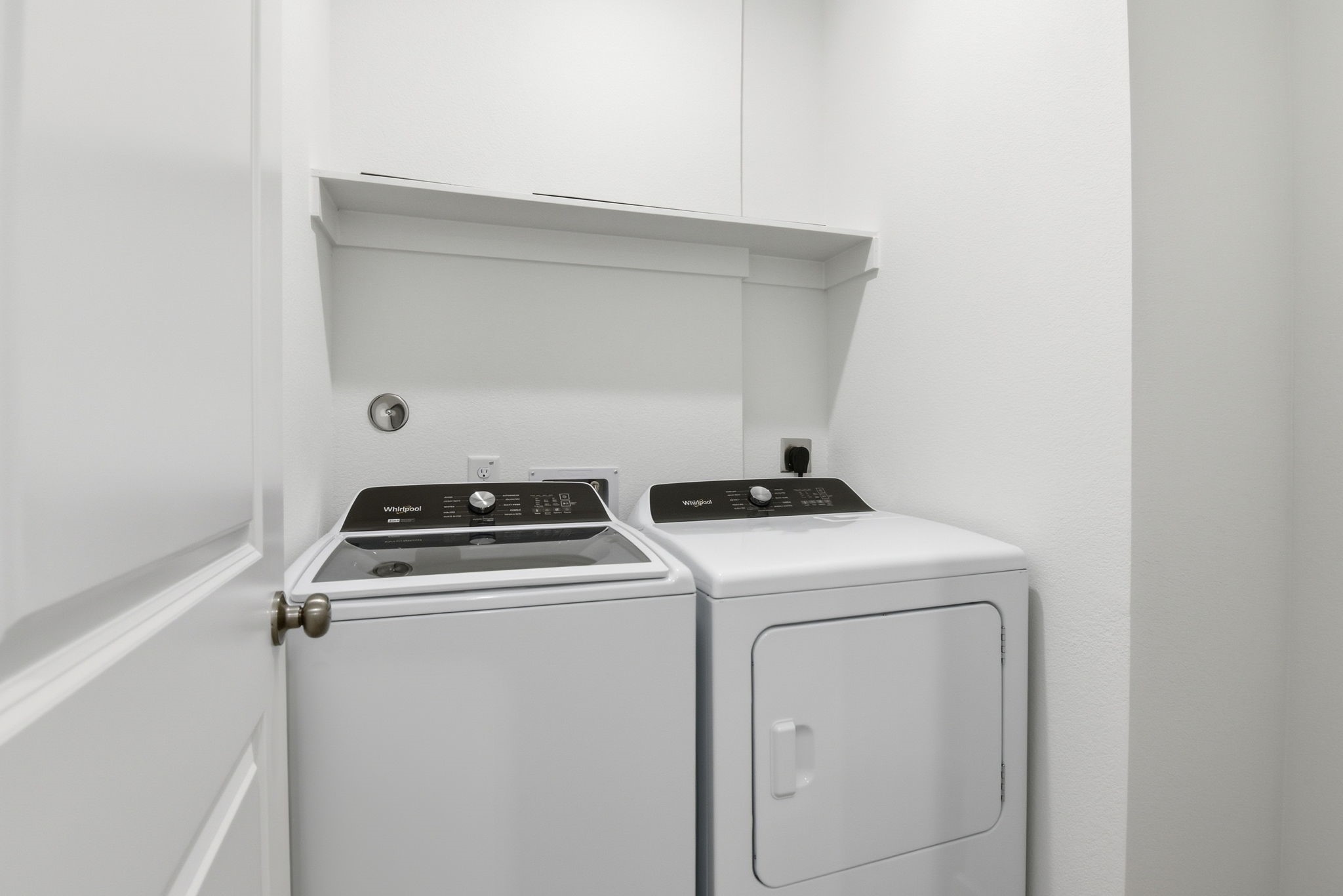 26283 Arrowleaf Drive Magnolia, TX 77355 - Photo 25 of 34 a utility room with dryer and washer