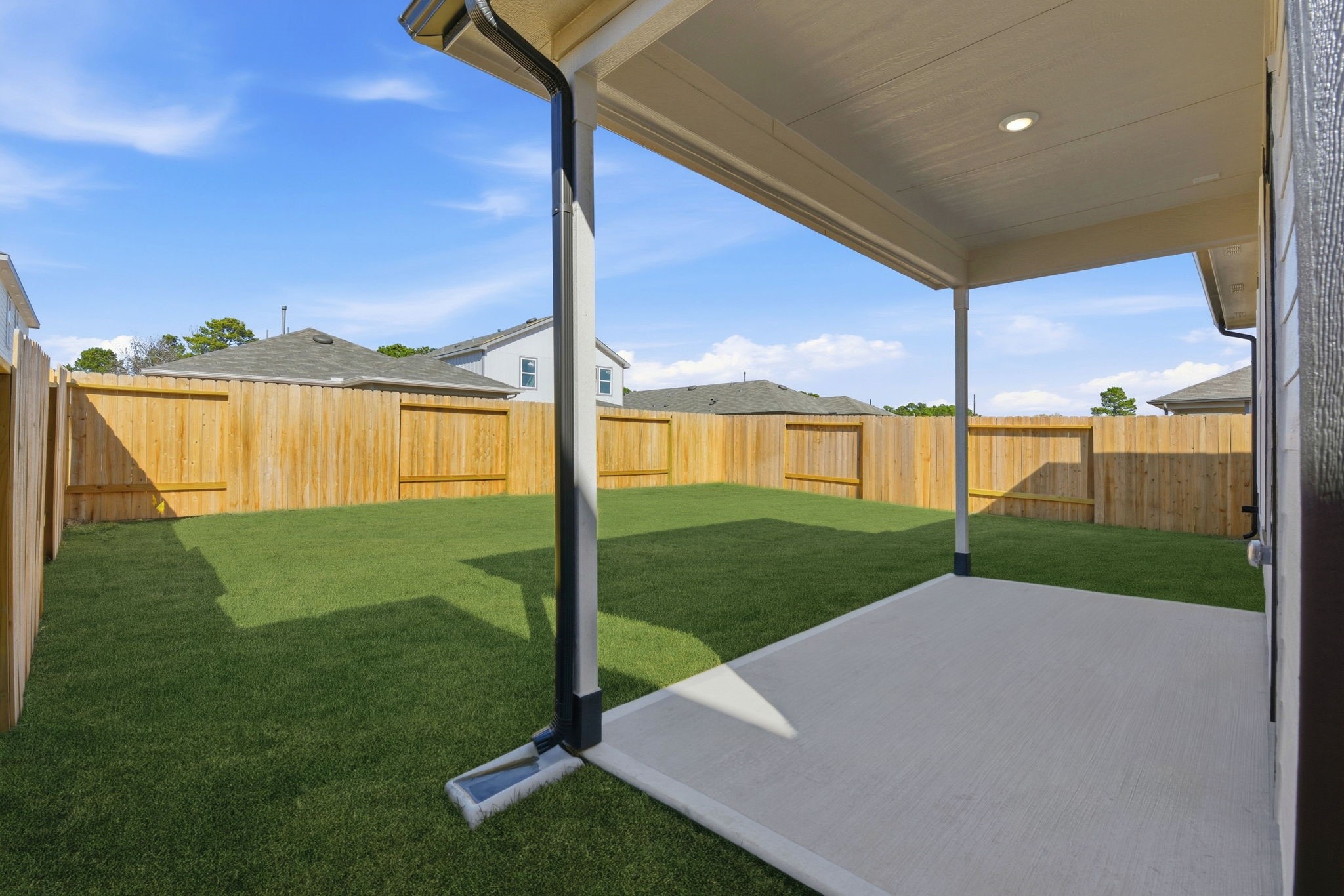 26283 Arrowleaf Drive Magnolia, TX 77355 - Photo 32 of 34 a view of a backyard with a lake view