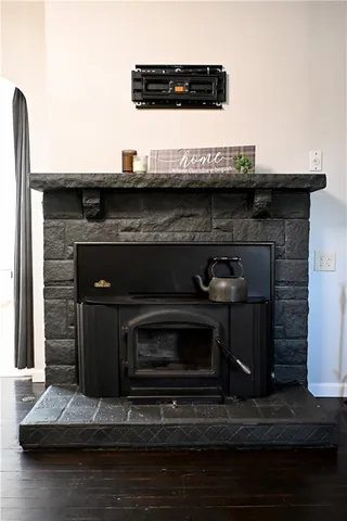 a stove top oven sitting inside of a kitchen