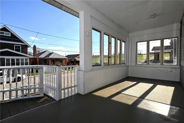 a view of an empty room and window