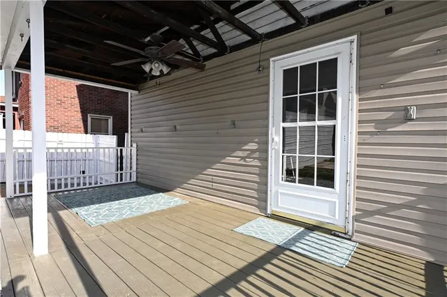 a view of a backyard with potted plants