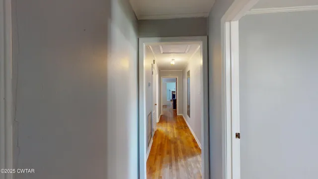 a view of a hallway with a small space