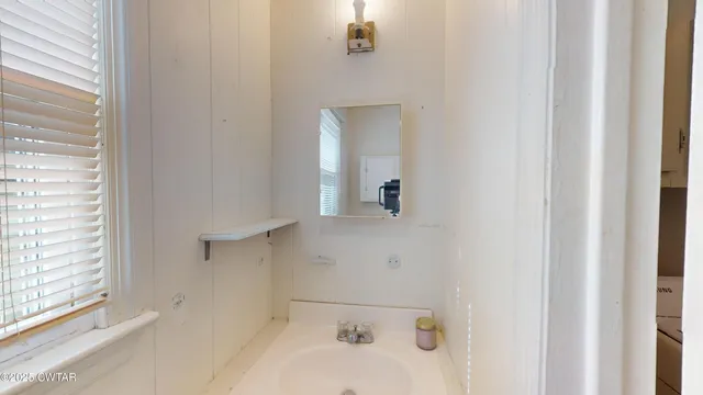 a bathroom with a bathtub
