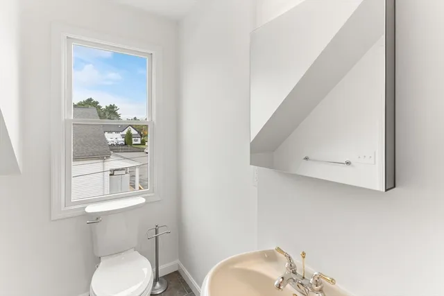 a view of a porch with wooden floor