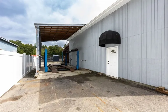 a picture of a bathroom with a shower