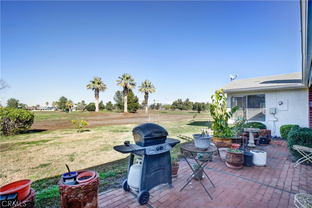 26490 McCall Boulevard Menifee, CA 92586 - Photo 13 of 14 a view of a lake with couches and city view