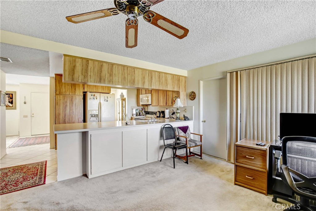 26490 McCall Boulevard Menifee, CA 92586 - Photo 6 of 14 a view of kitchen with workspace and window