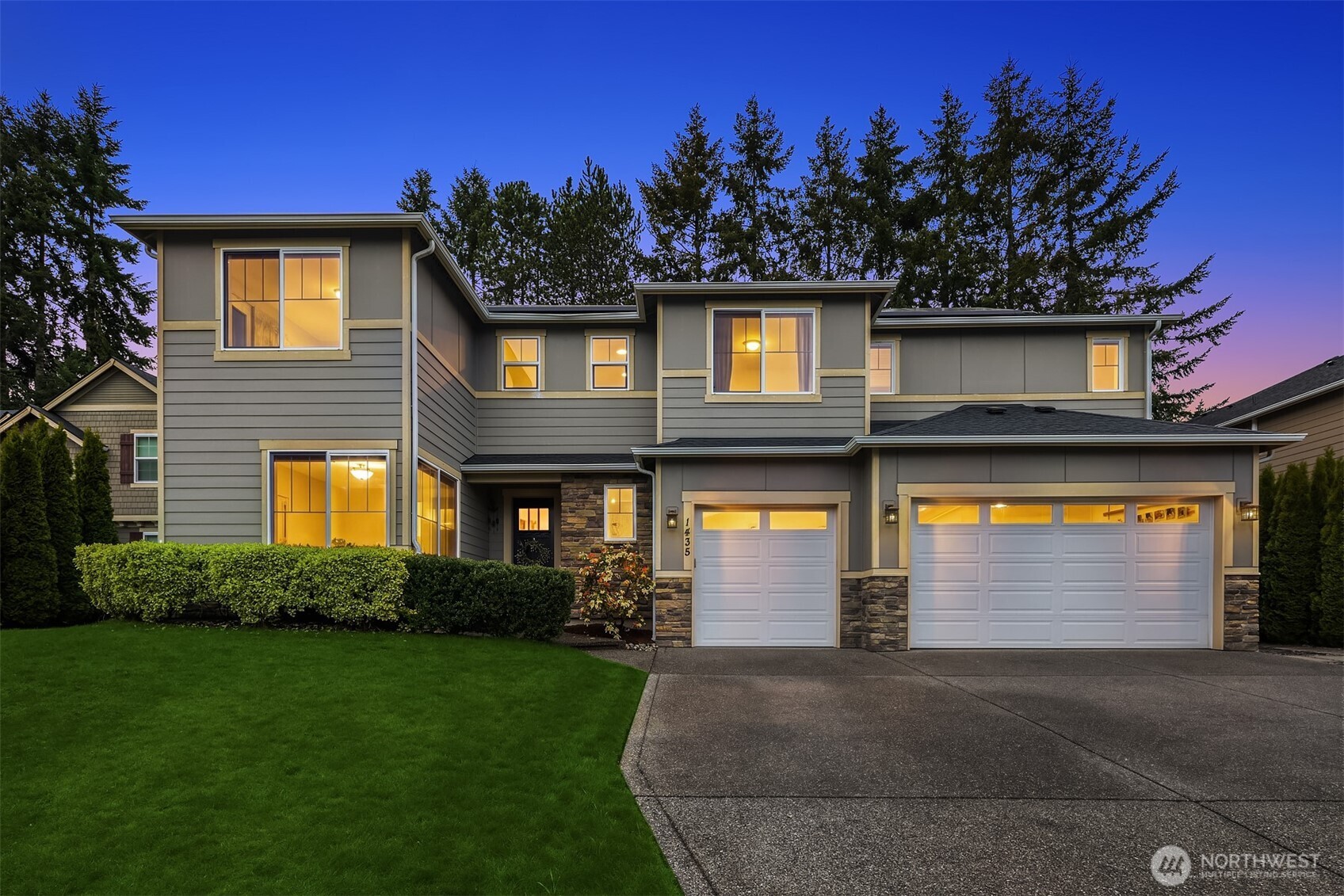 1435 242nd Place Southeast Bothell, WA 98021 - Photo 3 of 40 a front view of house with yard