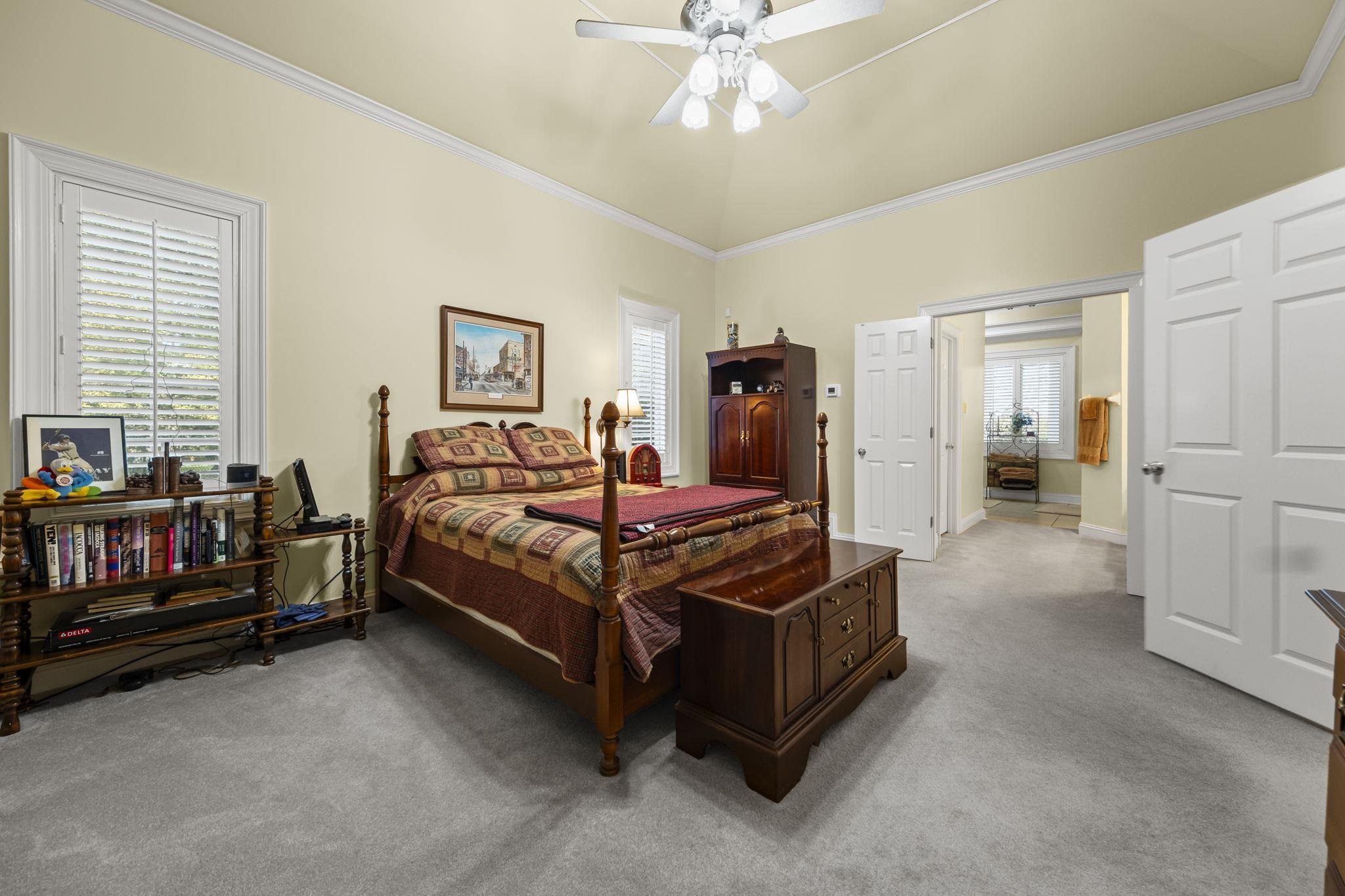 450 Cherry Road Eads, TN 38028 - Photo 15 of 24 a bedroom with a bed and cabinets