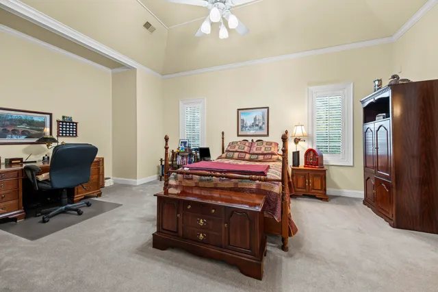 a bathroom with a bathtub and a window