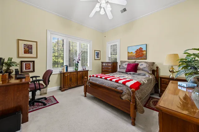 a kitchen with a sink cabinets and window