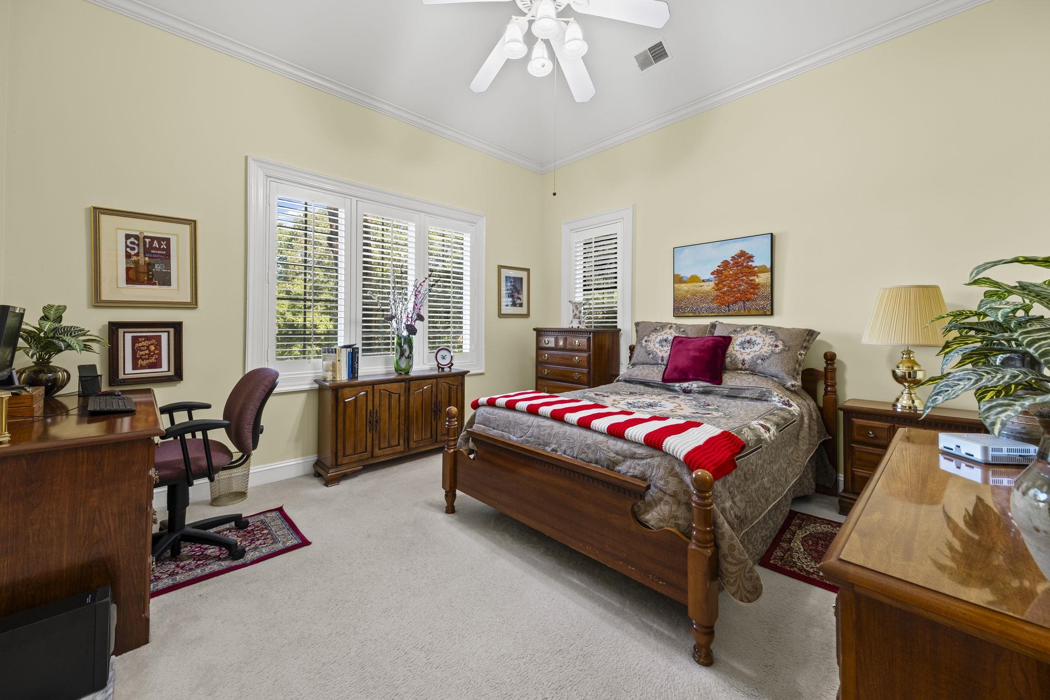 450 Cherry Road Eads, TN 38028 - Photo 20 of 24 a bedroom with a bed and a couch