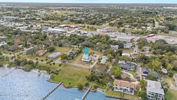 an aerial view of residential building with parking space