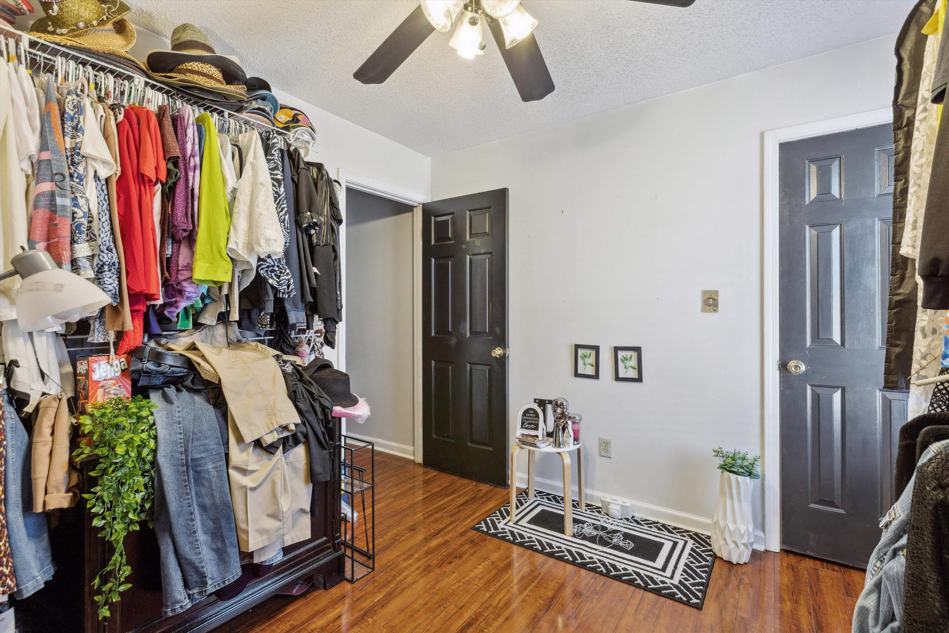 4120 Long Creek Road Memphis, TN 38125 - Photo 22 of 26 Bedroom ft. a ceiling fan, wood floors & walk-in closet.