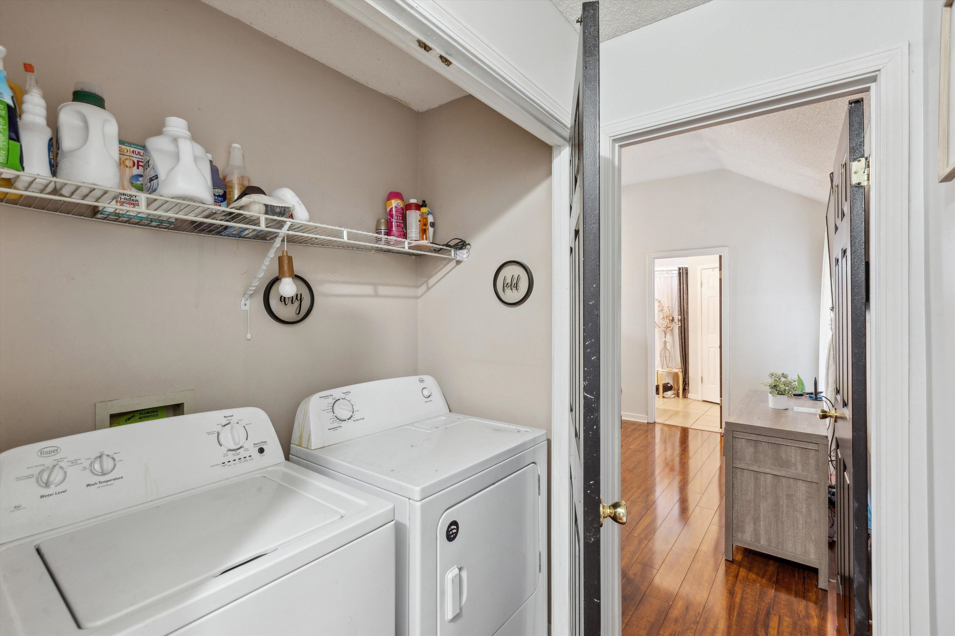 4120 Long Creek Road Memphis, TN 38125 - Photo 23 of 26 Laundry closet in hallway featuring wire shelving.