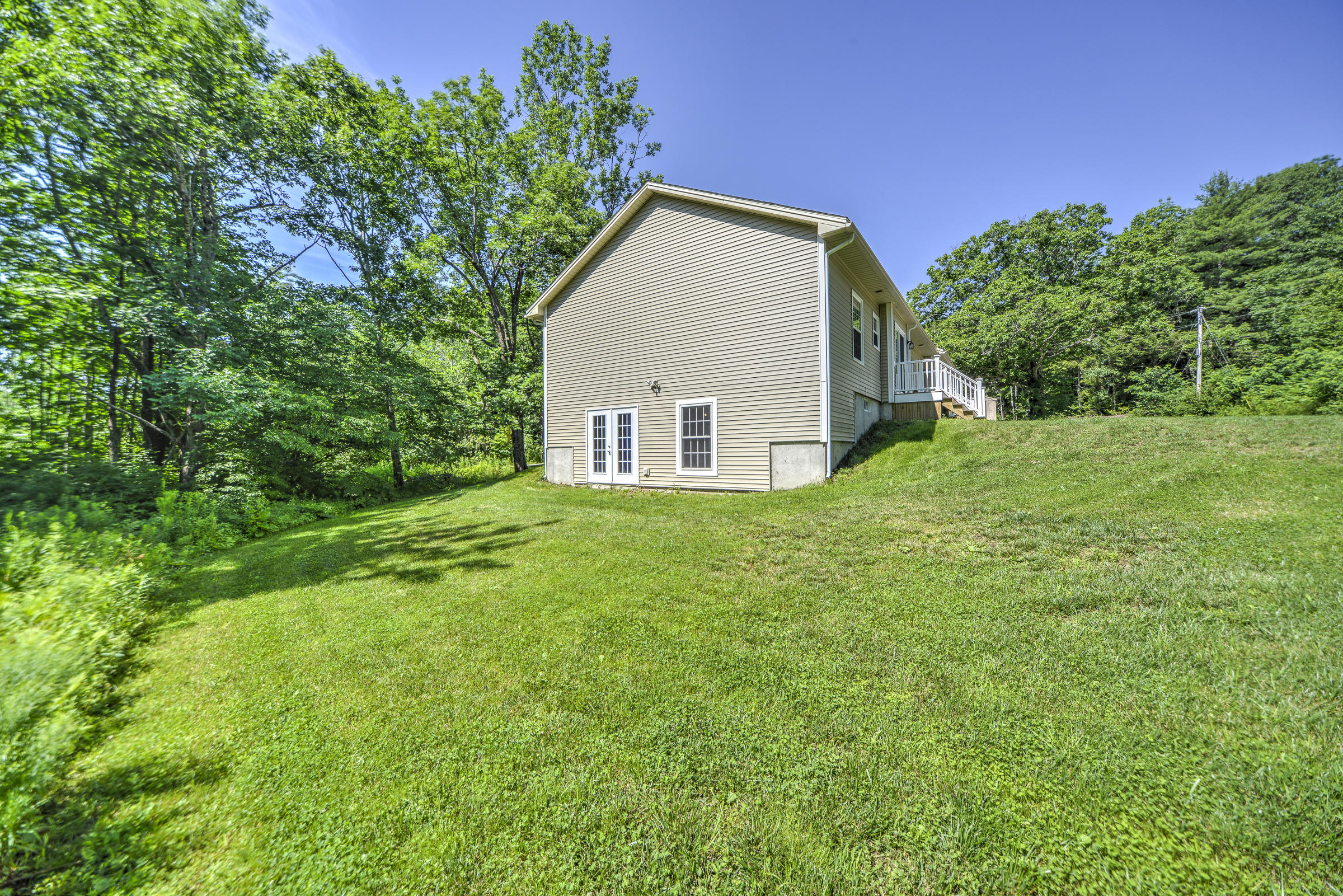 210 Common Road Dresden, ME 04342 - Photo 38 of 41 Side View, Basement Access