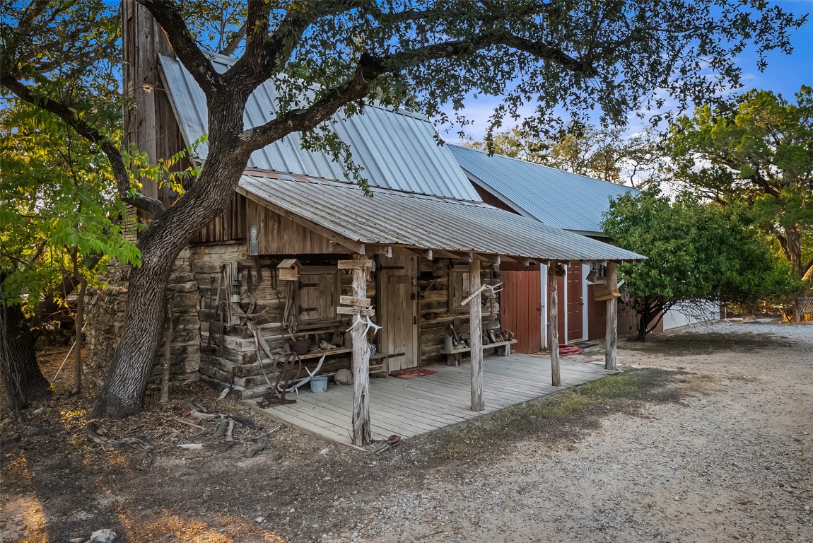 16020 Pool Canyon Road Austin, TX 78734 - Photo 7 of 29 a view of a house with a yard and sitting area